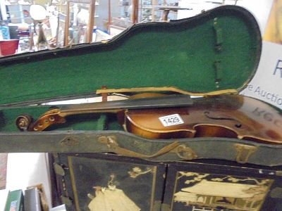 An old violin in case, a/f.