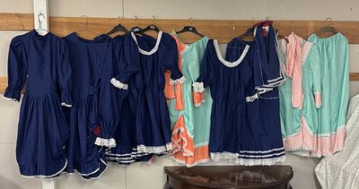 A quantity of vintage dresses.