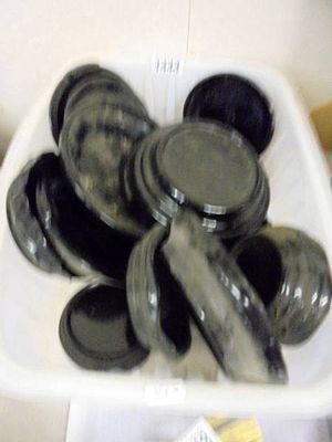 A quantity of black ceramic stands.