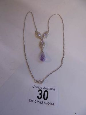 A hall marked silver amethyst set pendant.
