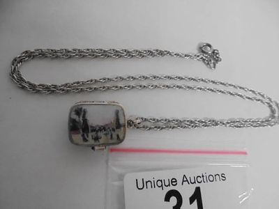 A good small enamel locket.