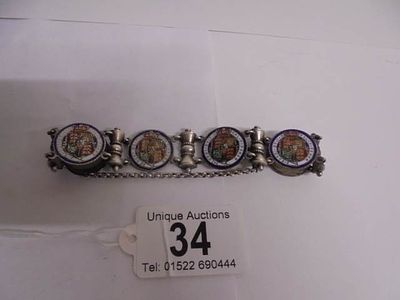 A white metal enamel bracelet.