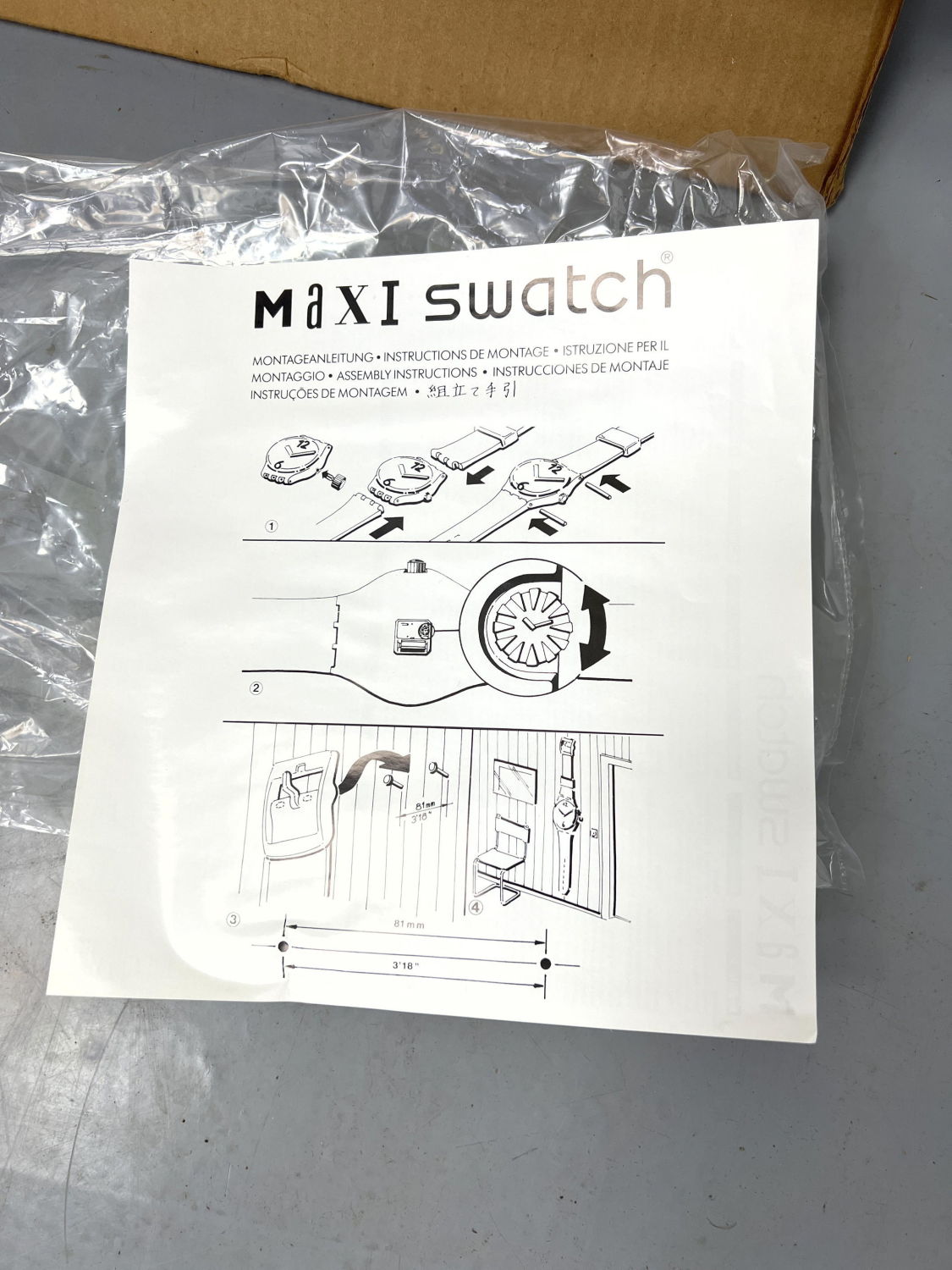 Lot 1393 - New old stock MAXI Swatch CAUTION Wall clock watch form