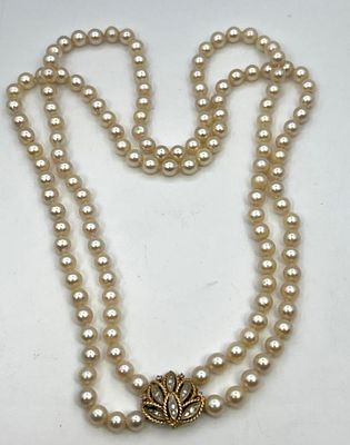 Set Pearls with 14k Gold and Diamond Clasp. 1" clasp pearls 6mm Dimensions: Height: inches