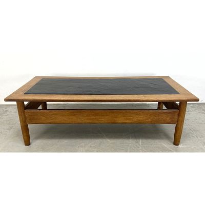 Dutch oak and slate coffee table. Inset top. Dimensions: Height: 16 inches, Width: 51 inches 