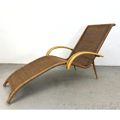 Woven Rattan Chaise Lounge, Mid-Century Modern style Dimensions: Height: 34 inches, Width: 