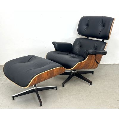 Eames style lounge chair and matching ottoman. Dimensions: Height: 34 inches, Width: 33.5 