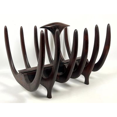 Mid Century Modern Rib Motif Magazine Rack. Sculptural Rosewood form. Rows of Bowed "Ribs" 