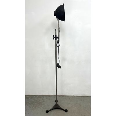 Vintage industrial floor lamp. Adjustable with tripod base Dimensions: Height: 65 inches 