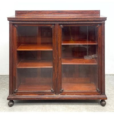 Antique Rosewood 2 Door Bookcase. Bun Feet. Dimensions: Height: 46.5 inches, Width: 50 inches 