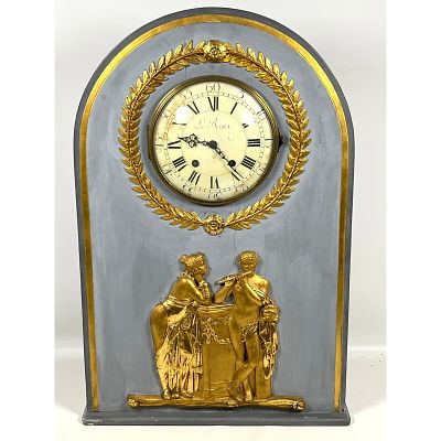 Large Neoclassical style mantel clock featuring an arched wooden case finished in gray paint 