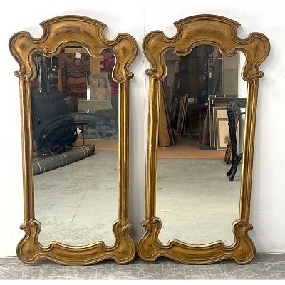 Pair of tall vertical wall mirrors in the Rococo Revival style. Dimensions: Height: 51 inches 