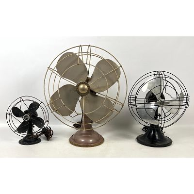 3pcs Vintage Fans. The largest unit is a Westinghouse model 16SD4, finished in a metallic tan 