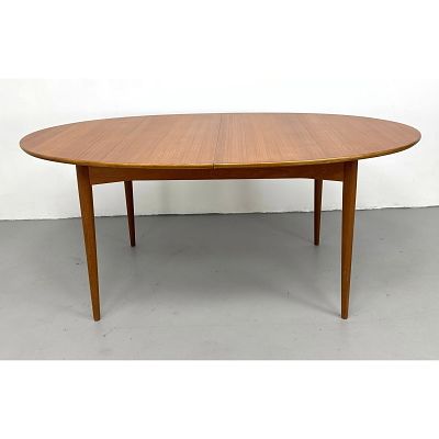 Danish Modern Teak Oval Butterfly-Leaf Dining Table. Unsigned. . Includes: 1 - 30 inch leaf 