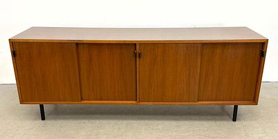 Florence Knoll Leather Pull Walnut Credenza with adjustable shelves. Laminate top. Dimensions: 