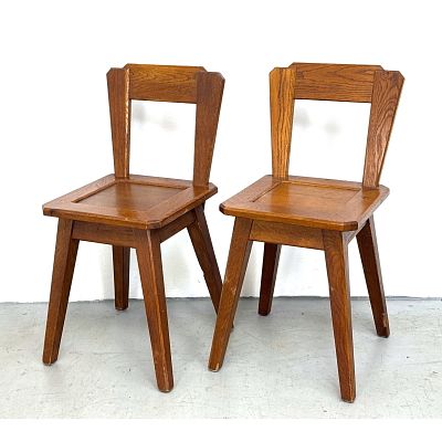 Pair 1950s Constructivist style oak side chairs. Dutch style. Dimensions: Height: 30 inches 