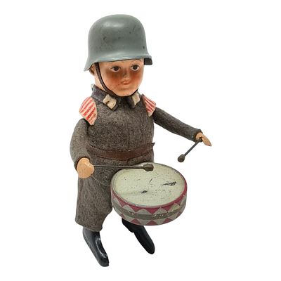 German WWII Schuco Toy - Wehrmacht Soldier with Drum. COMES WITH THE OFTEN MISSING ORIGINAL KEY 