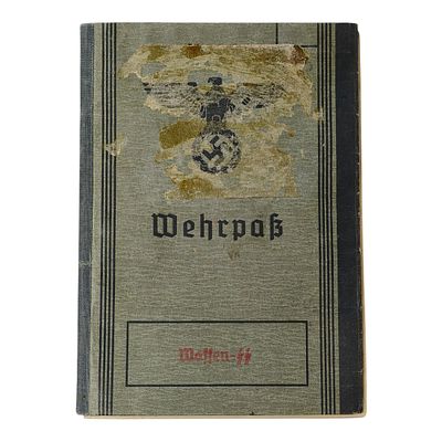 Waffen SS Wehrpass for Sachsenhausen Guard issued to Hennig, Arthur 
The Wehrpass records 