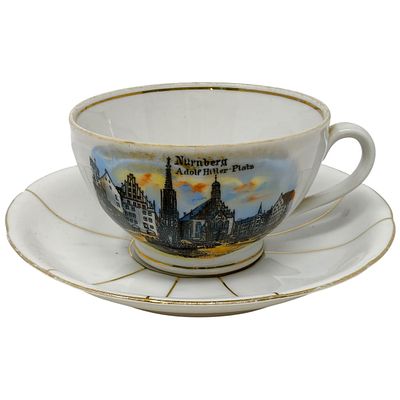 German 1930s Porcelain Souvenir Cup and Saucer - N&uuml;rnberg Adolf Hitler-Platz. A porcelain teacup 