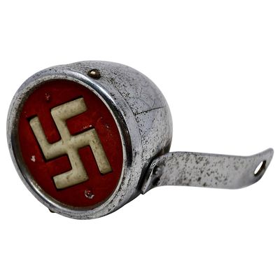 Early NSDAP Bicycle Fender OrnamentSmall metal party emblems of this kind were produced during 