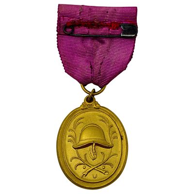 German Fire Brigade 40-Year Long Service Medal. An oval medal in what appears to be gilt bronze 
