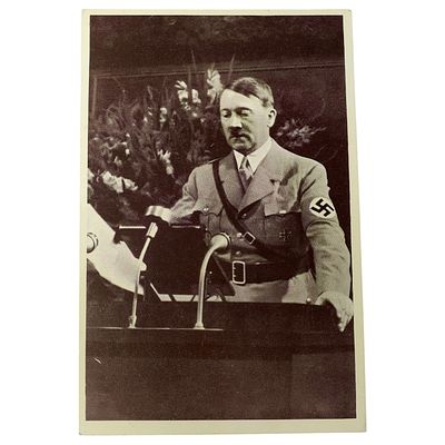 Adolf Hitler Propaganda Postcard. A photographic postcard depicting a uniformed speaker 
