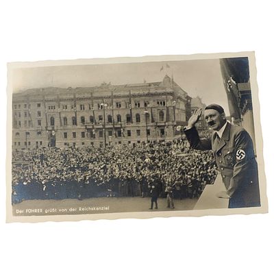 Adolf Hitler Propaganda Postcard. A real-photo postcard captioned "Der FUEHRER gruesst von der 