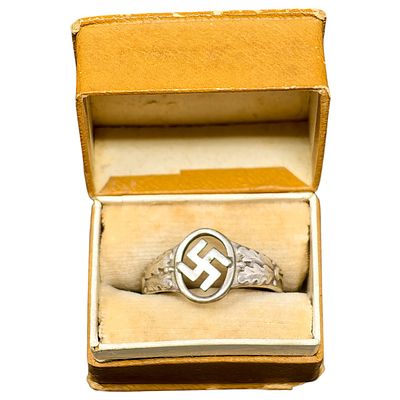 German WWII Period Ring with Mobile Swastika Motif and Oak Leaf Shoulders, in J.J. Fischer Jeweler C