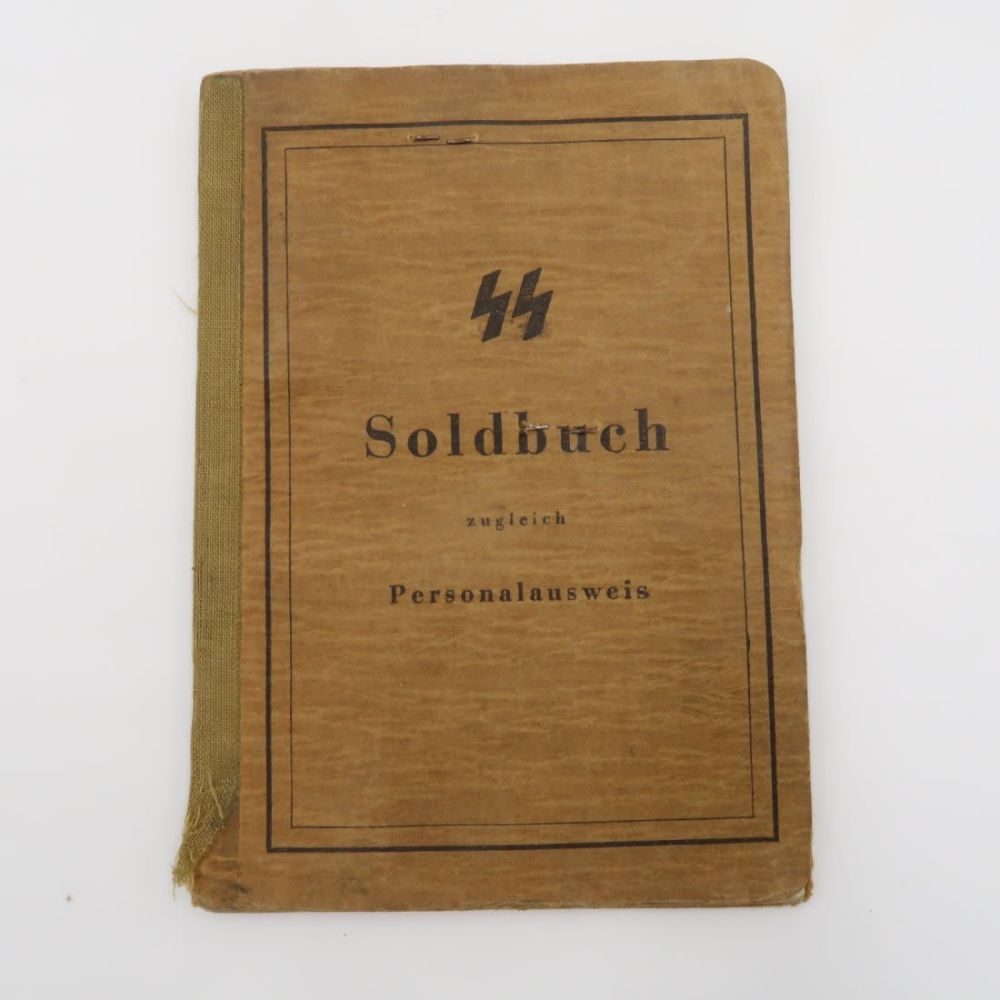 Lot 927: SS Soldbuch to a Hungarian Volunteer with few Entries