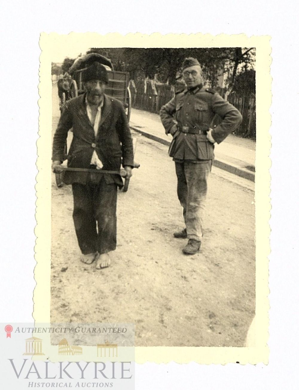Lot 218: Photo of a Jew Being Denigrated Forced to Carry a Carriage Like a Horse