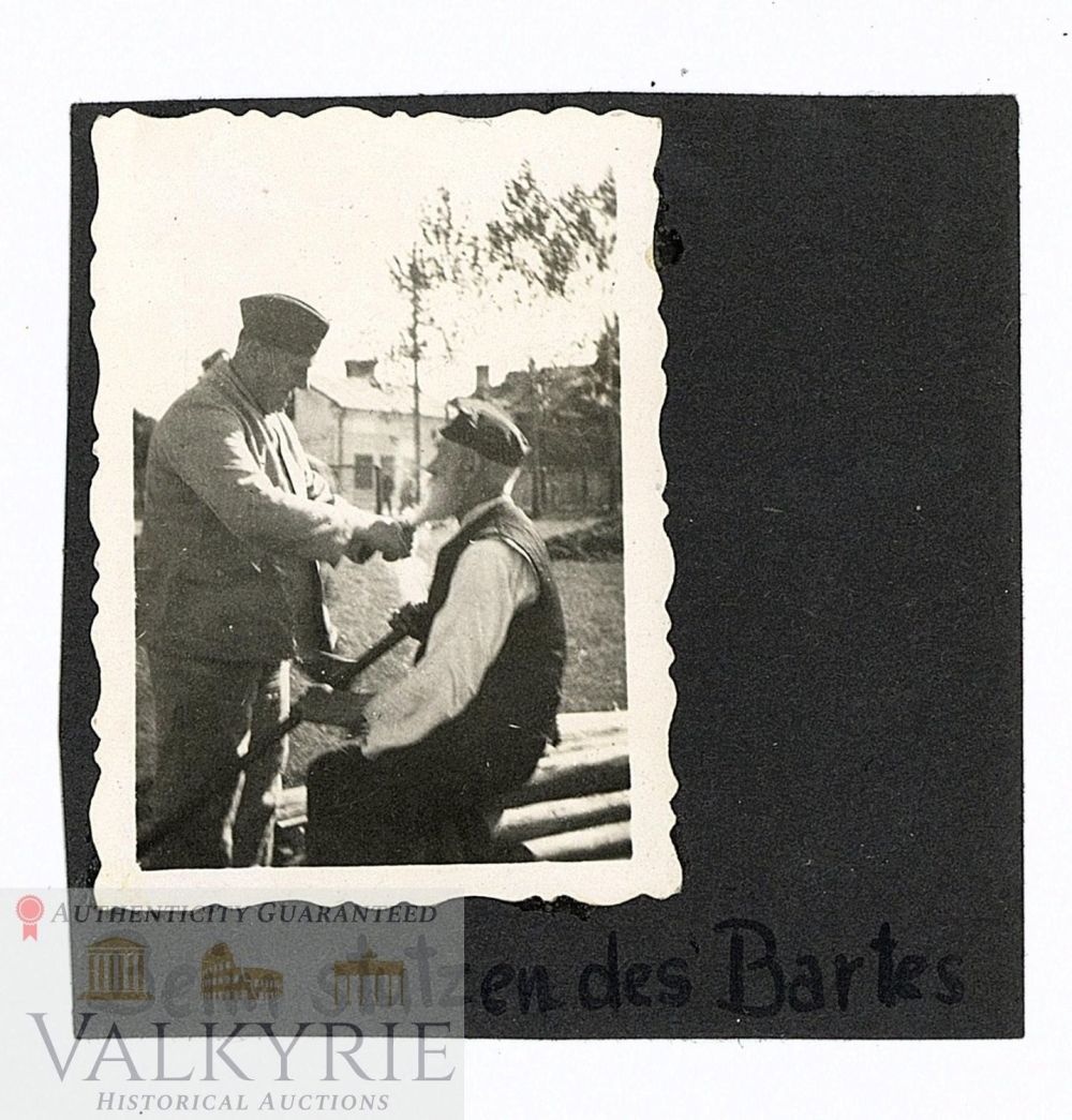 Lot 221: Touching Photo of a German Soldier Cutting an Elderly Jew's Beard Denigrating Him