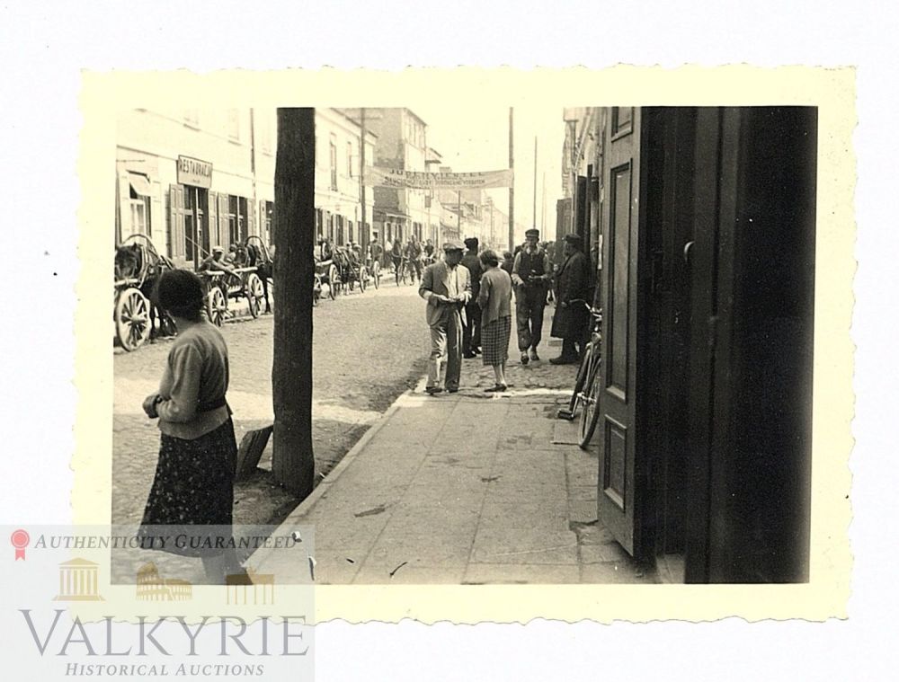 Lot 223: Rare Photo of the Jewish Ghetto in Polish City of Biala With Big Sign