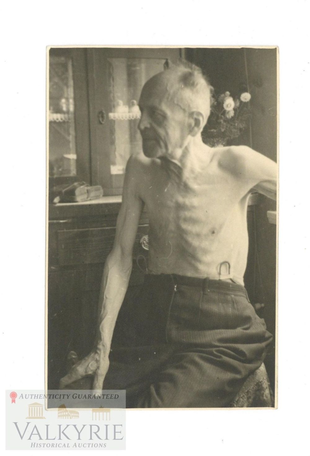 Lot 432: Postcard Size Photo of a Skinny Elderly Man - Prisoner? 1945