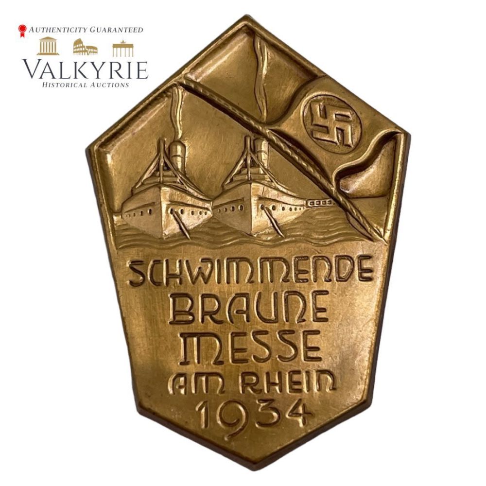 Lot 308: Early Nazi Badge "Schwimmende Braune Messe 1934 Rhine River"