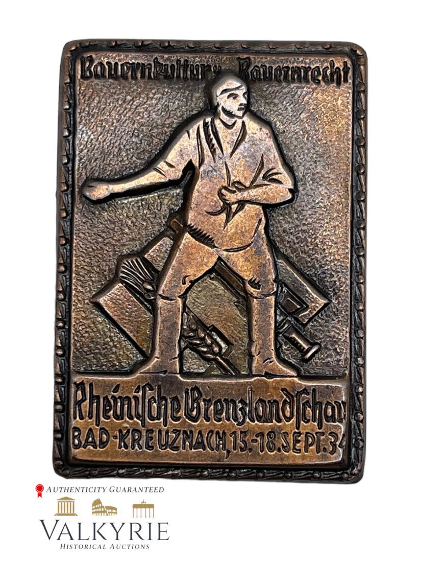 Lot 318: Nazi Badge "â€˜Bauernkultur Bauernrecht Rheinische Grenzlandschau Bad Kreuznach 1934"