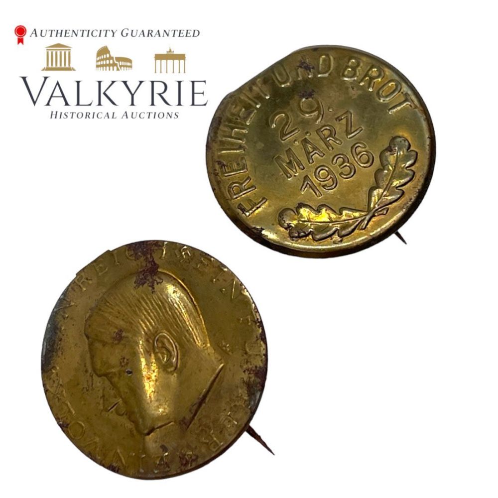 Lot 373: A 1936 â€œFreedom And Bread” and Hitler -  Election Badges set