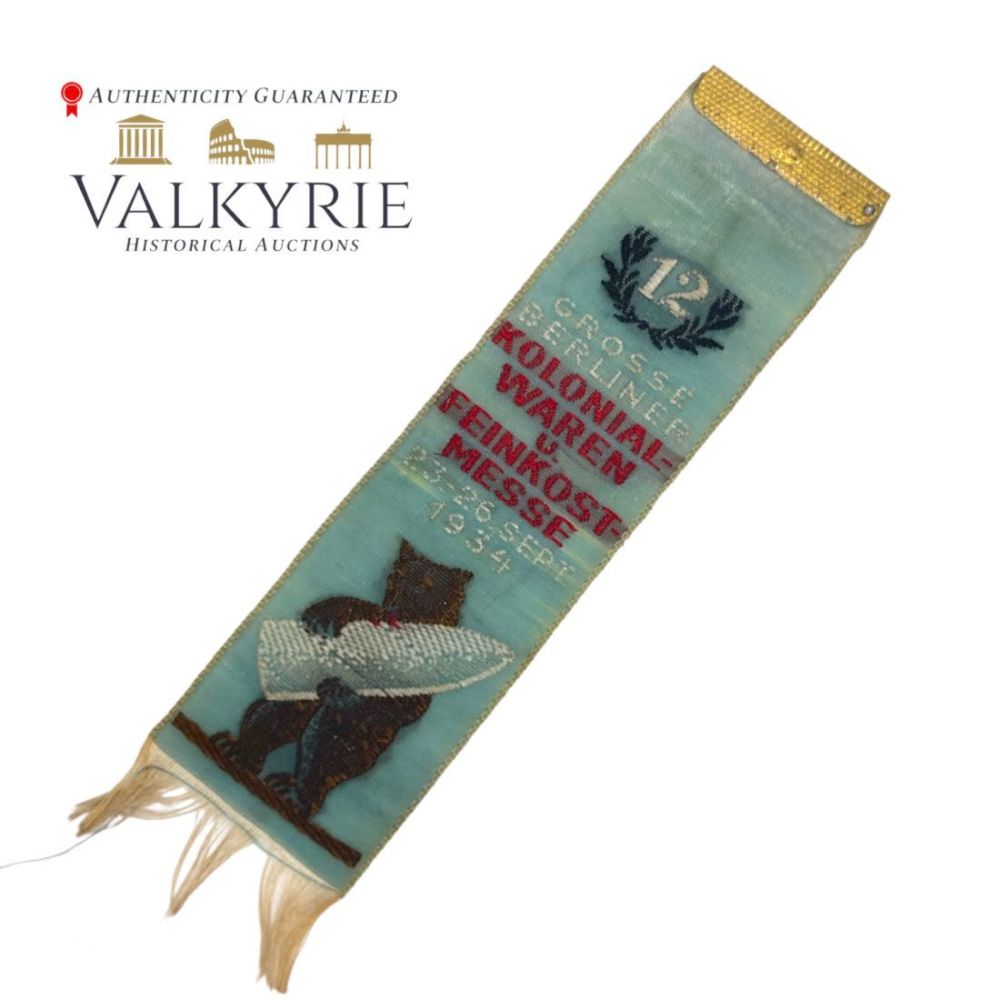 Lot 668: Commemorative Silk Ribbon "12th Big Fair of Colonial Goods and Delicatessen 1934"