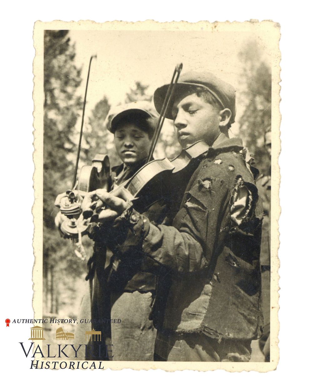 Lot 253: Private Taken Photo of 2 Polish Jewish Boys With Misrable Clothes Playing Their Violins