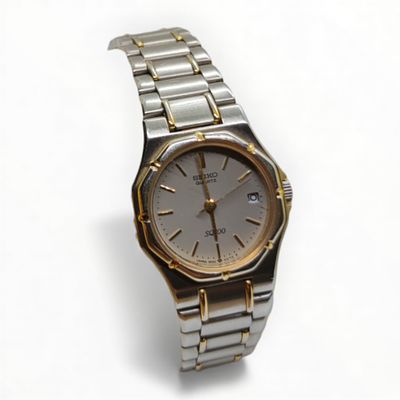 SEIKO Armbanduhr HAU . Vintage SEIKO Quarz Armbanduhr Edelstahl vergoldet, Kopf ca. 27,4 x 36 