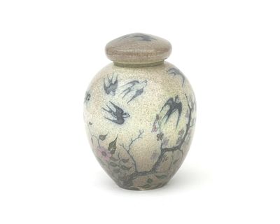 Jan Willem Mijnlieff (1862-1940) An earthenware covered jar with polychrome floral decoration 