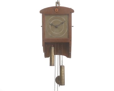 Jacob Pieter van den Bosch (1868-1948) An oak wall clock with a copper dial and two weights 