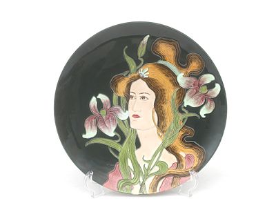 Julius Dressler (1882-1945) An Art Nouveau-style majolica wall plate, marked “JBD” on the back 
