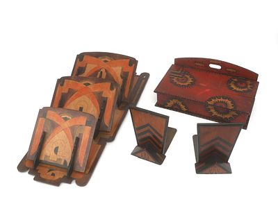 Art Deco A batik wooden newspaper rack, a wooden box with a lid, and two bookends with brass 
