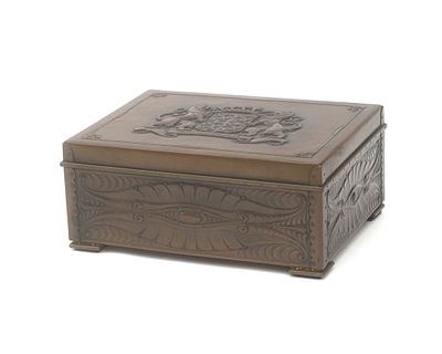 J. Heerens, 1944 A hammered copper jewelry box with purple velvet upholstered oak interior. 