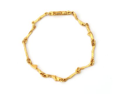 Een 14 krt. geelgouden Lapponia 'Rannio' armband Door Björn Weckström. De armband bestaat uit 