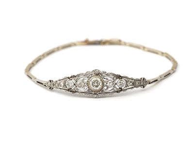 Een 20 krt. witgouden Art Deco armband met diamant Fijn schakelarmbandje voorzien van een 
