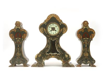 N.V. Haagsche Plateelfabriek Rozenburg, The Hague A three-piece polychrome earthenware clock 