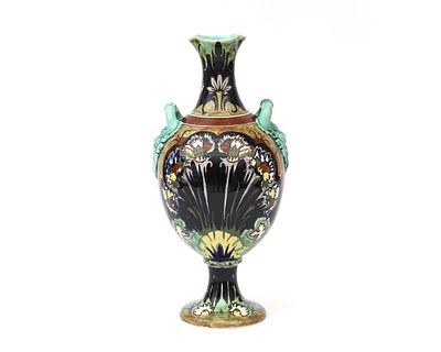 N.V. Haagsche Plateelfabriek Rozenburg, The Hague A polychrome painted vase with floral 