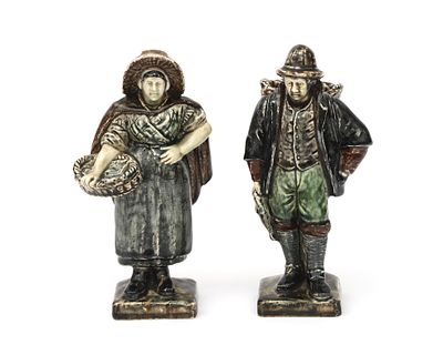 N.V. Haagsche Plateelfabriek Rozenburg, The Hague Two polychrome painted earthenware figures 