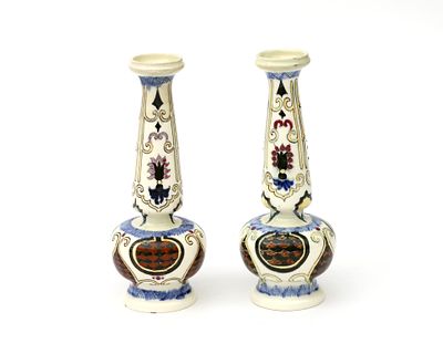 N.V. Haagsche Plateelfabriek Rozenburg, The Hague Two baluster-shaped polychrome painted 